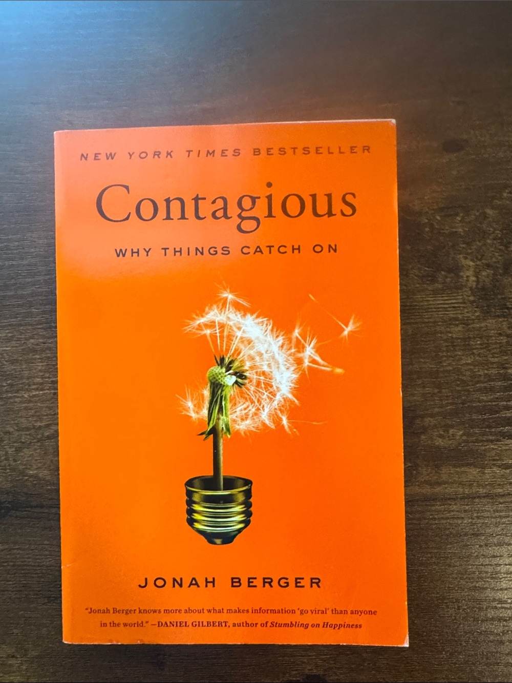 Contagious by Jonah Berger - Bright Orange Paperback